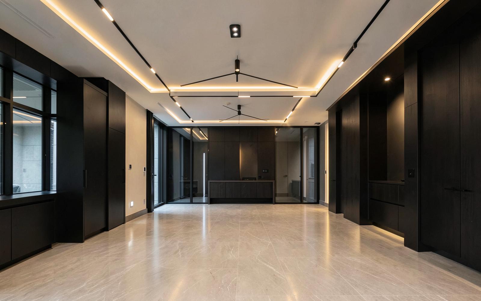 Finished modern interior illuminated by professionally installed lighting